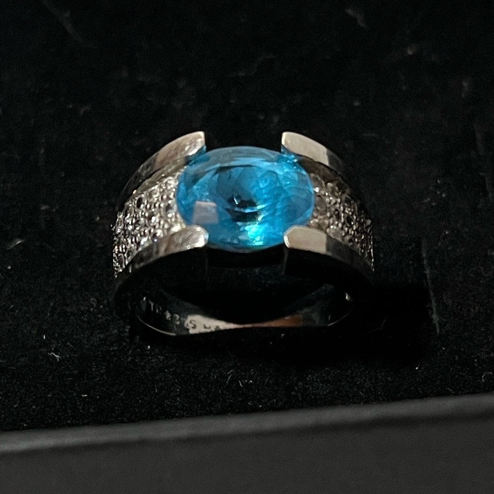 Sterling Silver Blue Topaz & CZ Ring. 
Size 6.5. 
Bold. Feminine. Perfect gift!